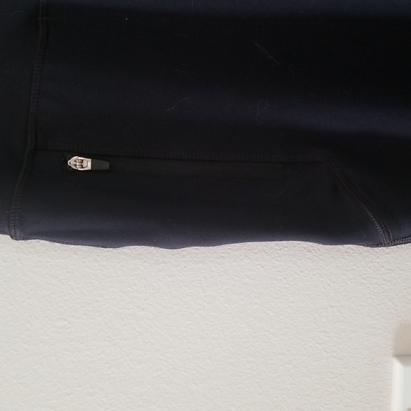 Fila Women's sport leggings with reflector strips zippers at bottom - Picture 4 of 7